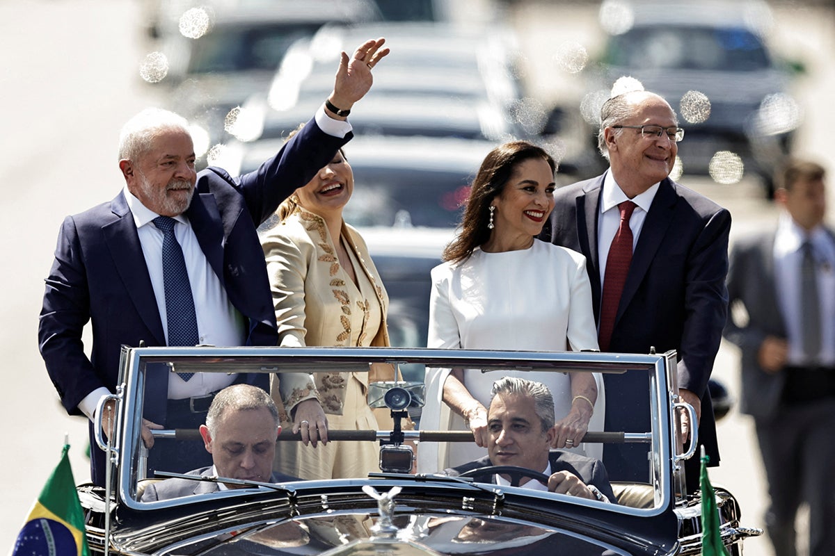 Lula rode in an open-top Rolls-Royce to the Planalto Palace to don the presidential sash