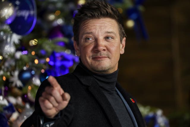 <p>Jeremy Renner poses for photographers upon arrival at the UK Fan Screening of the film "Hawkeye," in London</p>