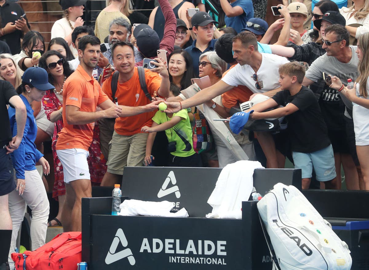 Novak Djokovic given warm welcome back to Australia in doubles defeat