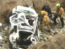 Two children and two adults critically injured after Tesla plunges over Devil’s Slide cliff in California