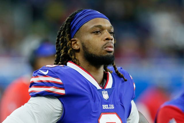 <p>File: Buffalo Bills safety Damar Hamlin looks on during the second half of an NFL football game </p>