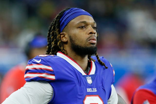 <p>File: Buffalo Bills safety Damar Hamlin looks on during the second half of an NFL football game </p>