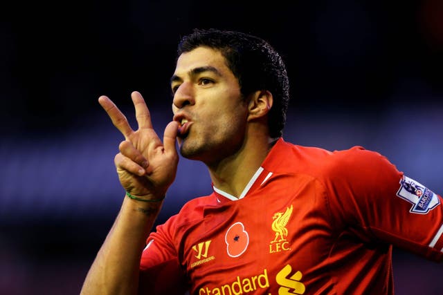 Luis Suarez was banned for eight matches for racism (Peter Byrne/PA)