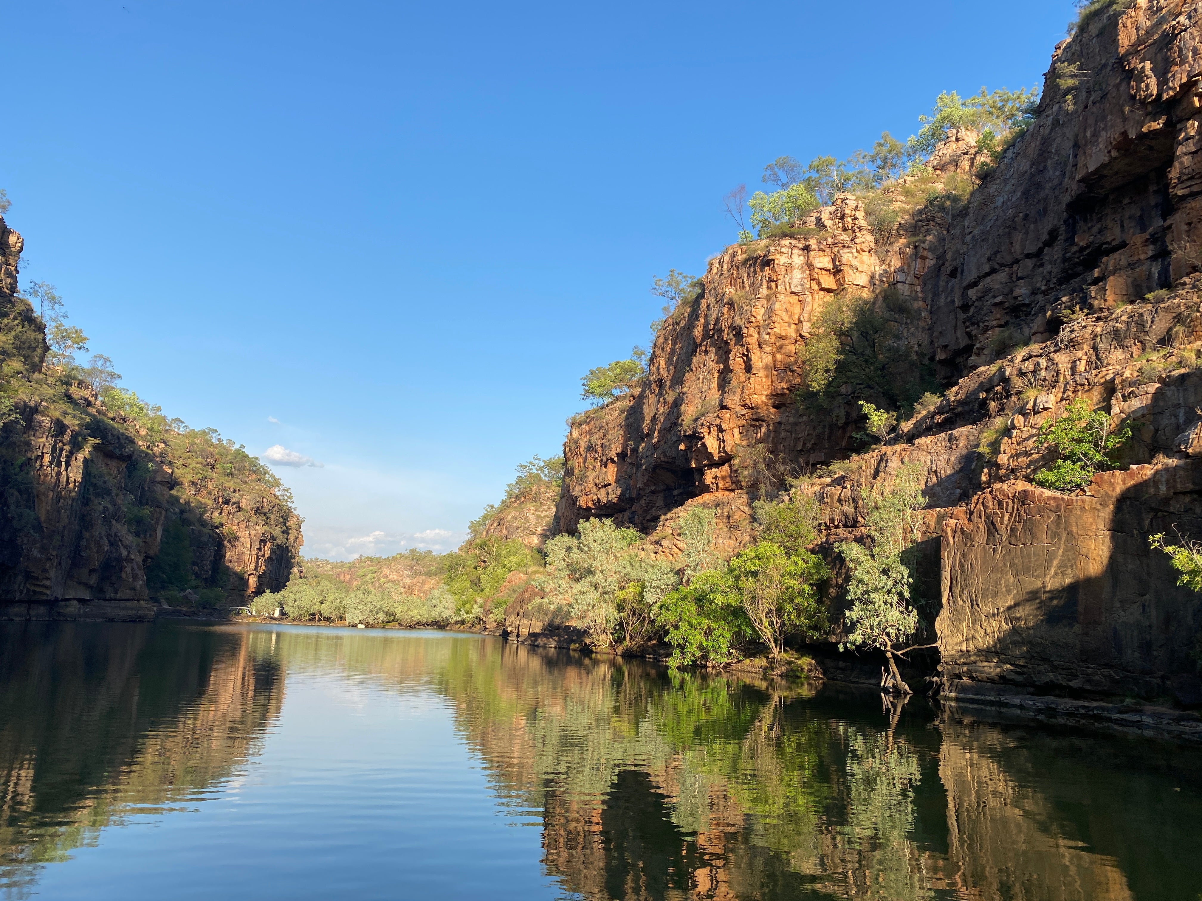 Take in stunning vistas in Nitmiluk Gorge and watch as the cliffs change with the light