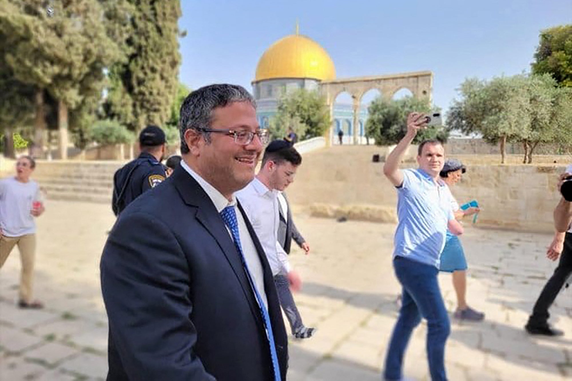 Itamar Ben-Gvir walks through the courtyard of Jerusalem’s al-Aqsa mosque compound on Tuesday