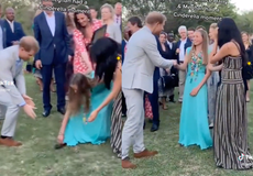Viewers praise Harry and Meghan after viral clip shows how they helped fan with her shoe: ‘Cinderella moment’