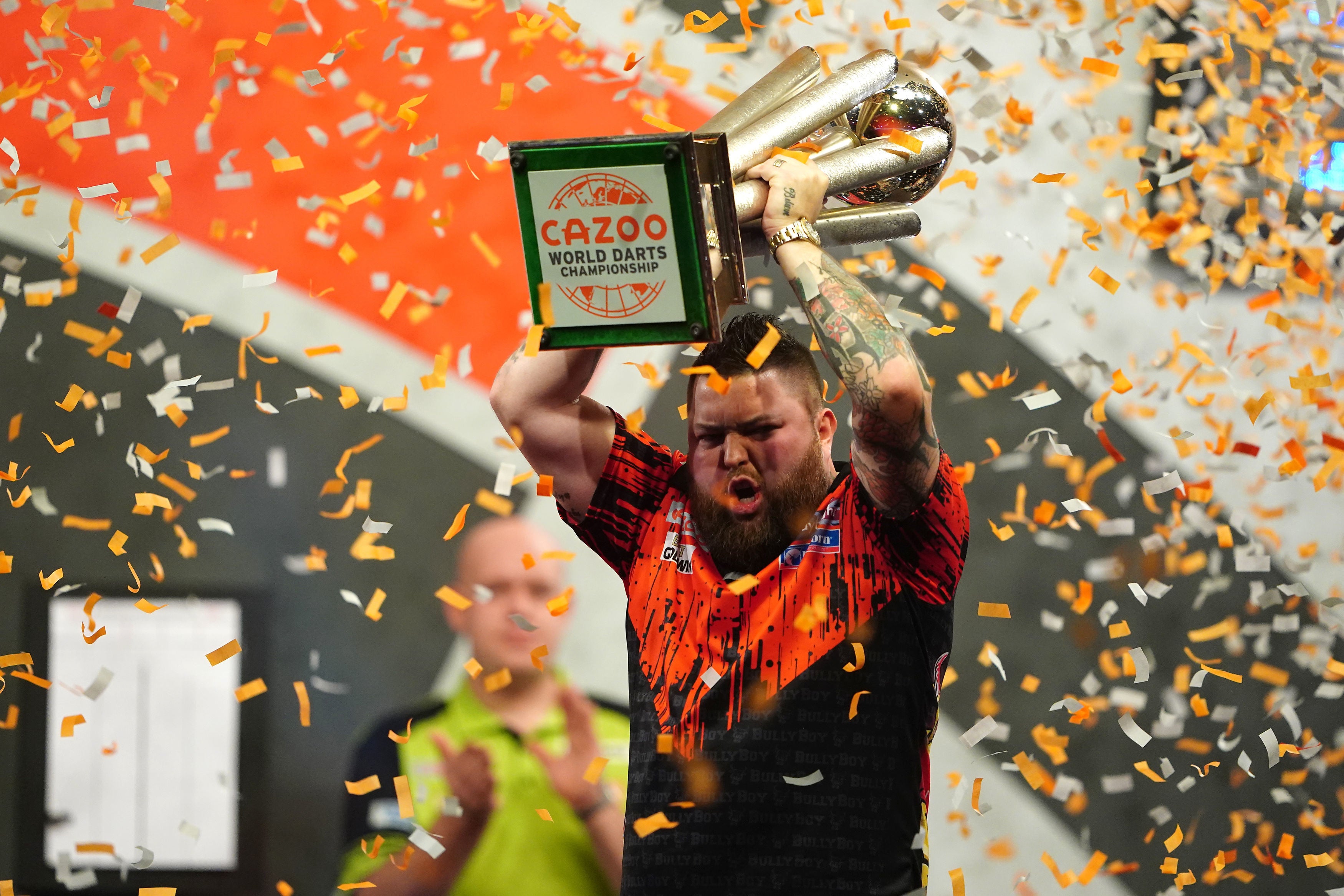 Michael Smith lifted the Sid Waddell Trophy after losing last year’s final