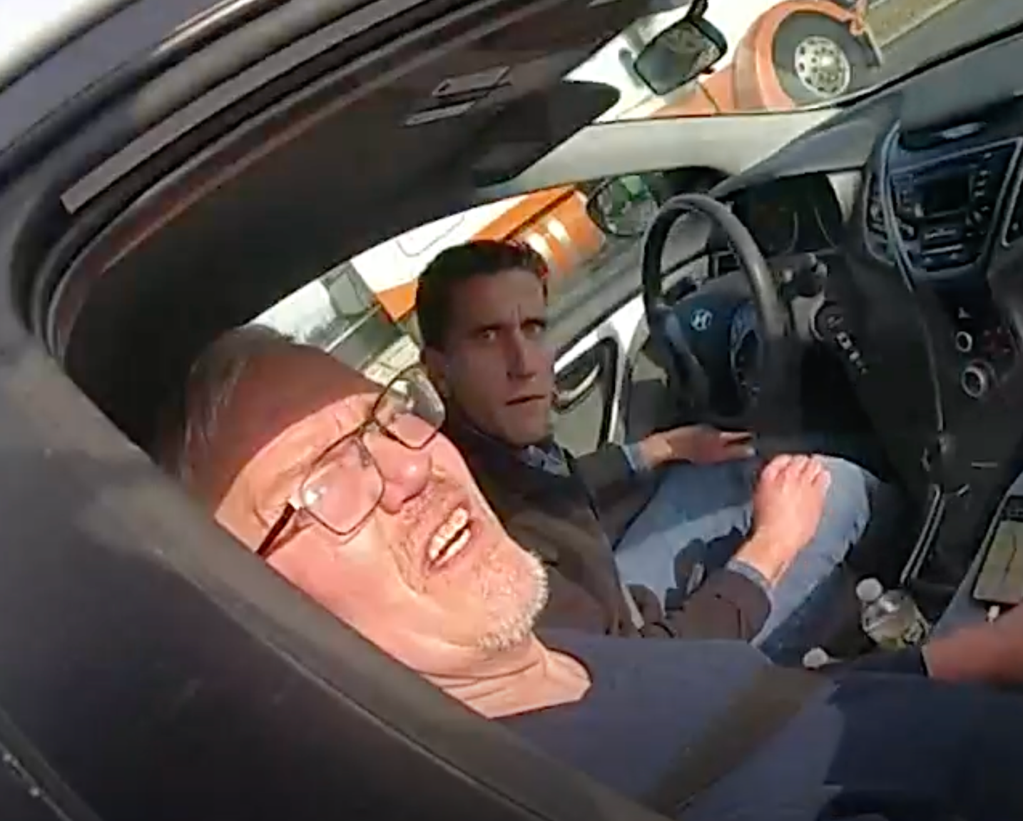 Bryan Kohberger and his father in bodycam footage after being pulled over by Indiana State Police on 15 December