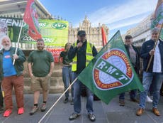 Strikes UK – live: One in five trains running as bus drivers walk out with rail workers