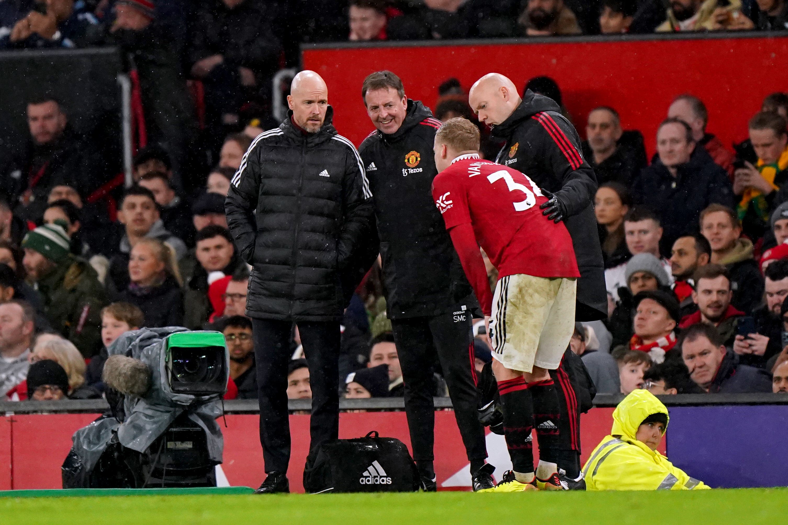 Donny van de Beek speaks to Erik ten Hag after being forced off through injury in Tuesday’s match against Bournemouth (Tim Goode/PA)