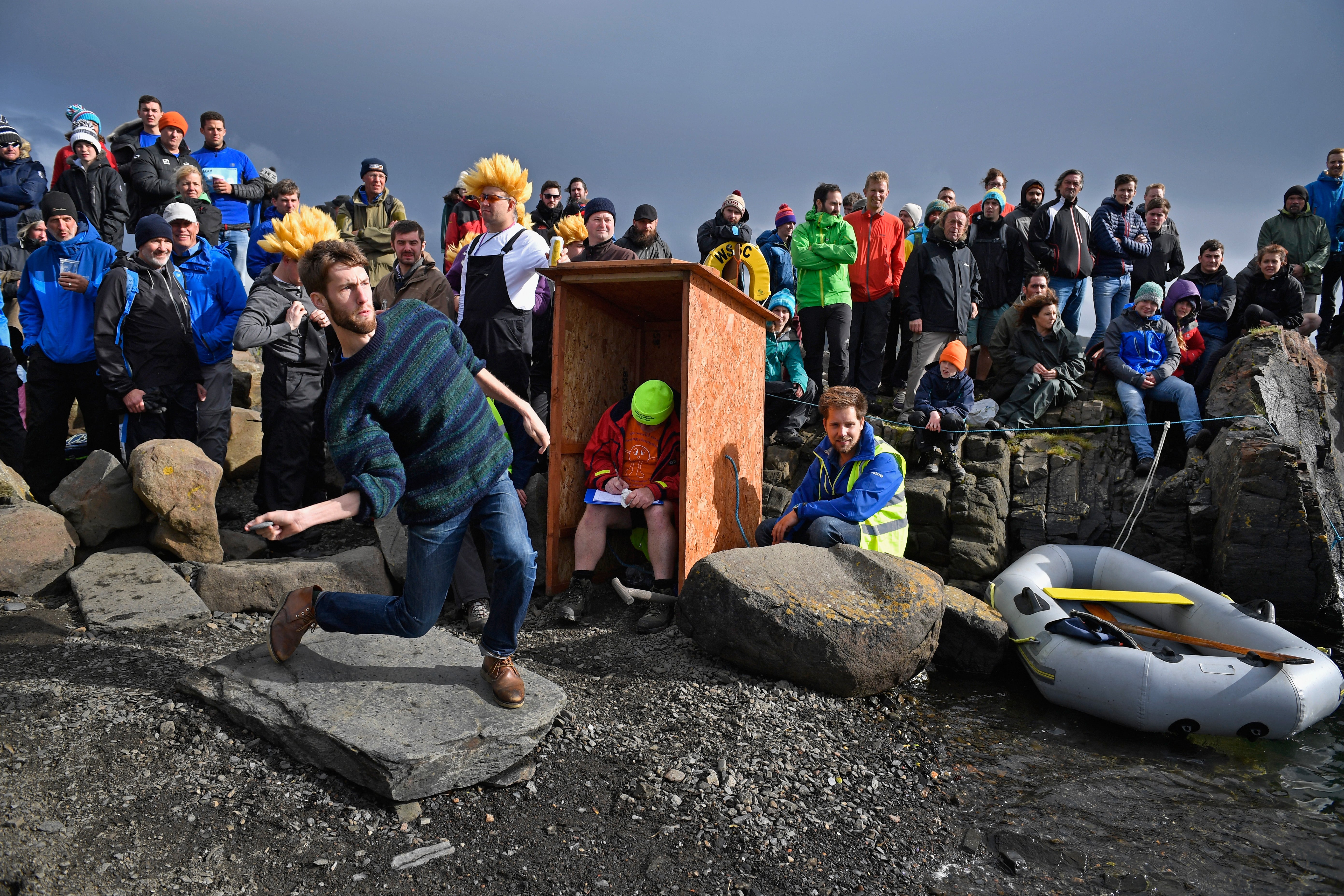 Competitors compete in the World Stone Skimming Championships, held on Easdale Island on September 25, 2016 in Easdale, Seil, Scotland
