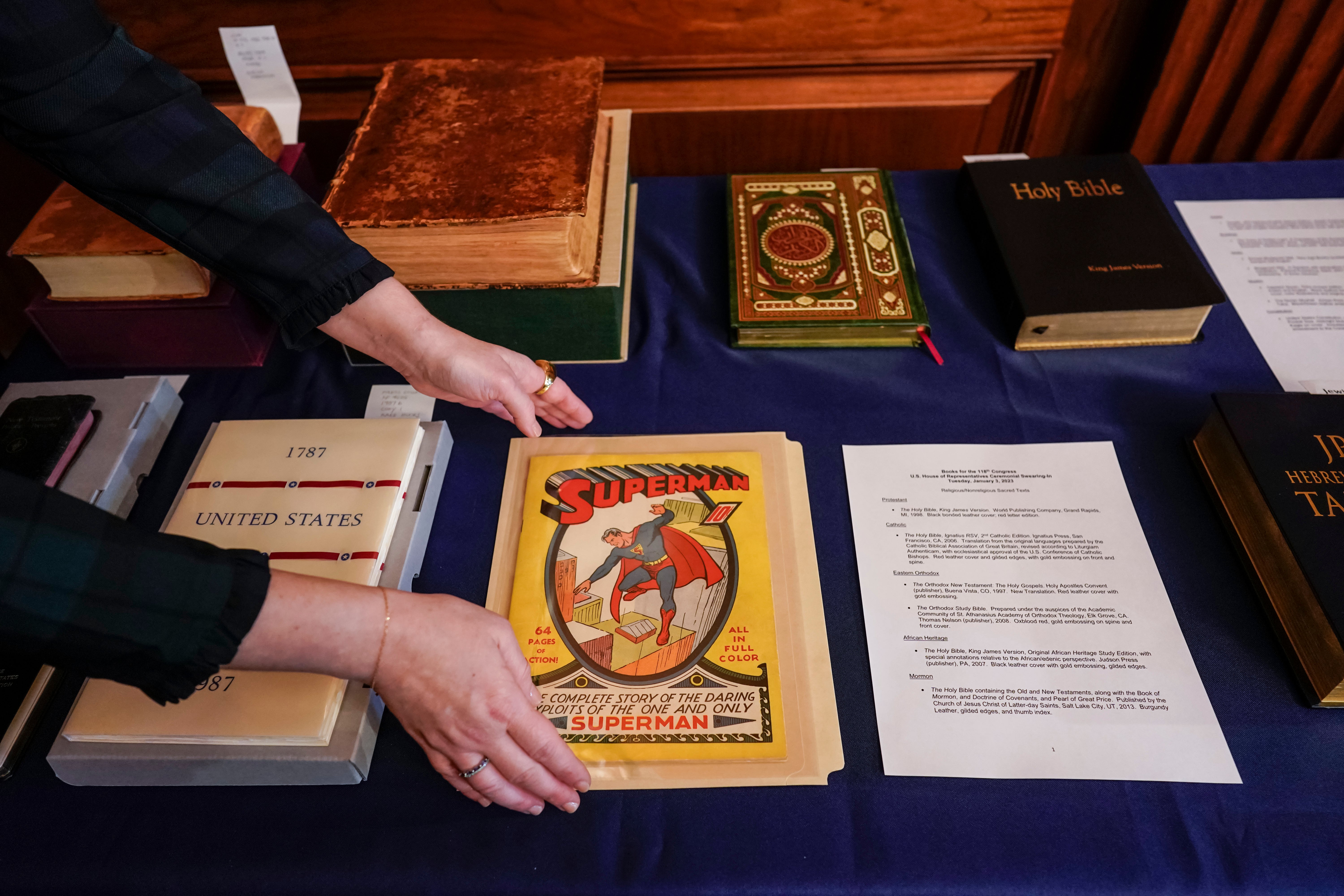 A first edition Superman comic from 1939 is placed with copies of the Constitution and a variety of other texts to be used in congressional swearing-in ceremonies.