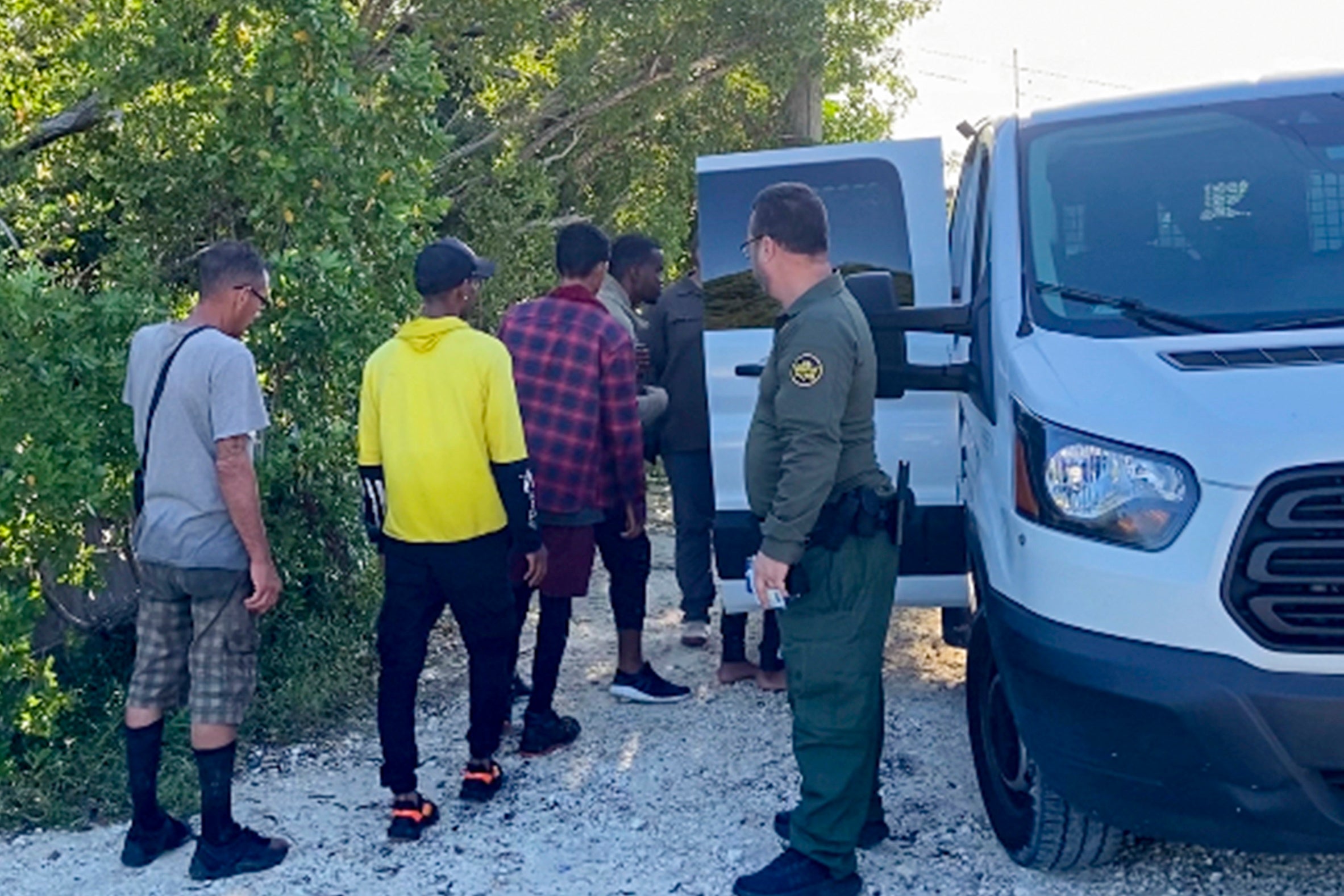 CORRECTION Migrants Florida