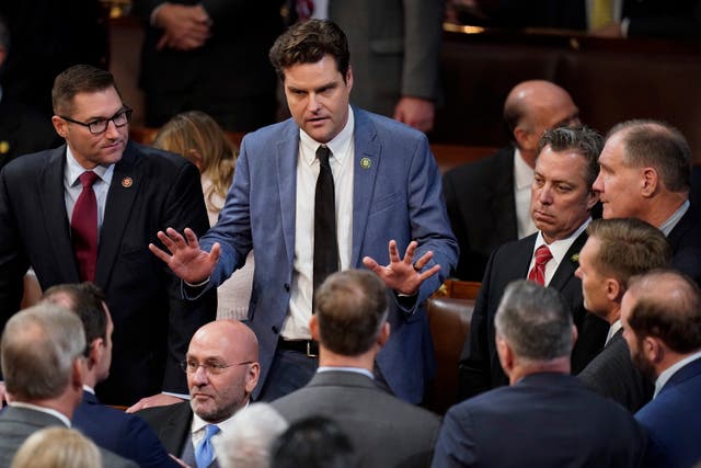 <p>Rep Matt Gaetz, R-Fla., talks with colleagues in the House chamber as the House meets for a second day to elect a speaker and convene the 118th Congress in Washington, Wednesday, Jan. 4, 2023</p>
