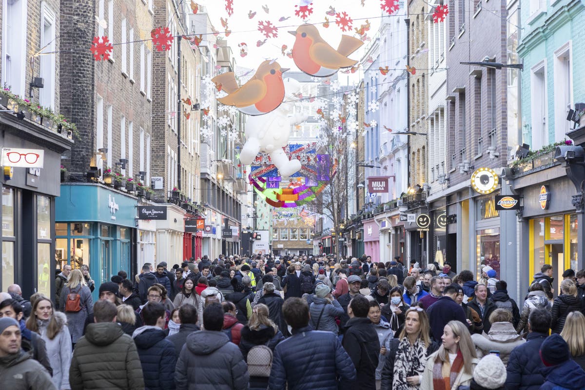 Christmas shoppers provide boost despite rail strikes and costof