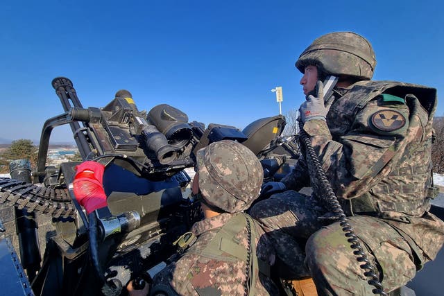 <p>Representative image: In this handout image released by the South Korean Defense Ministry, South Korean soldiers operating a 20mm Vulcan rotary cannon during an anti-drone drill on 29 December 2022 in Yangju,South Korea</p>