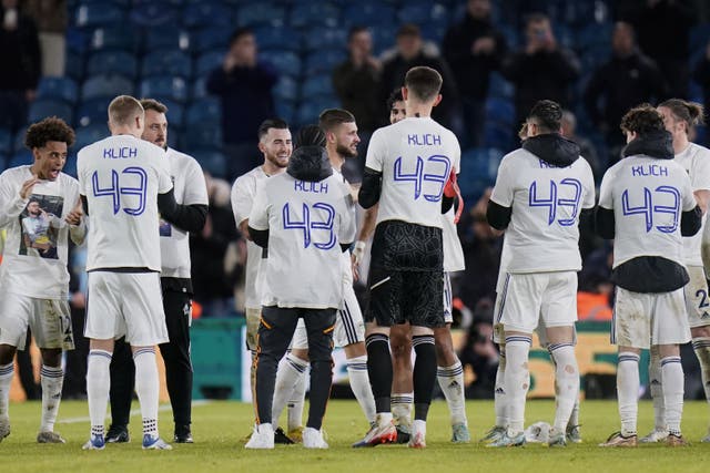 Leeds players donned T-shirts in tribute to Mateusz Klich, centre, after their 2-2 home draw against West Ham (Danny Lason/PA)