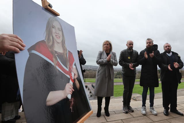 Sinn Fein vice-president Michelle O’Neill with Natalie McNally’s brothers (Liam McBurney/PA)
