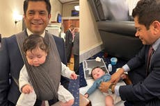 Democratic congressman Jimmy Gomez wears baby in carrier during House speaker votes