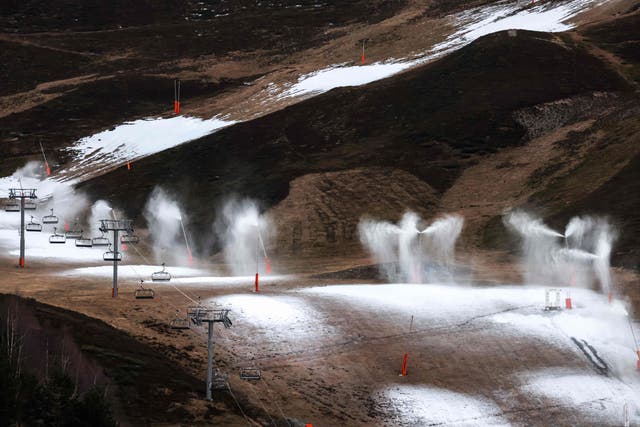 <p>Snow cannons operate due to lack of snow at the Peyragudes ski resort, southwestern France</p>