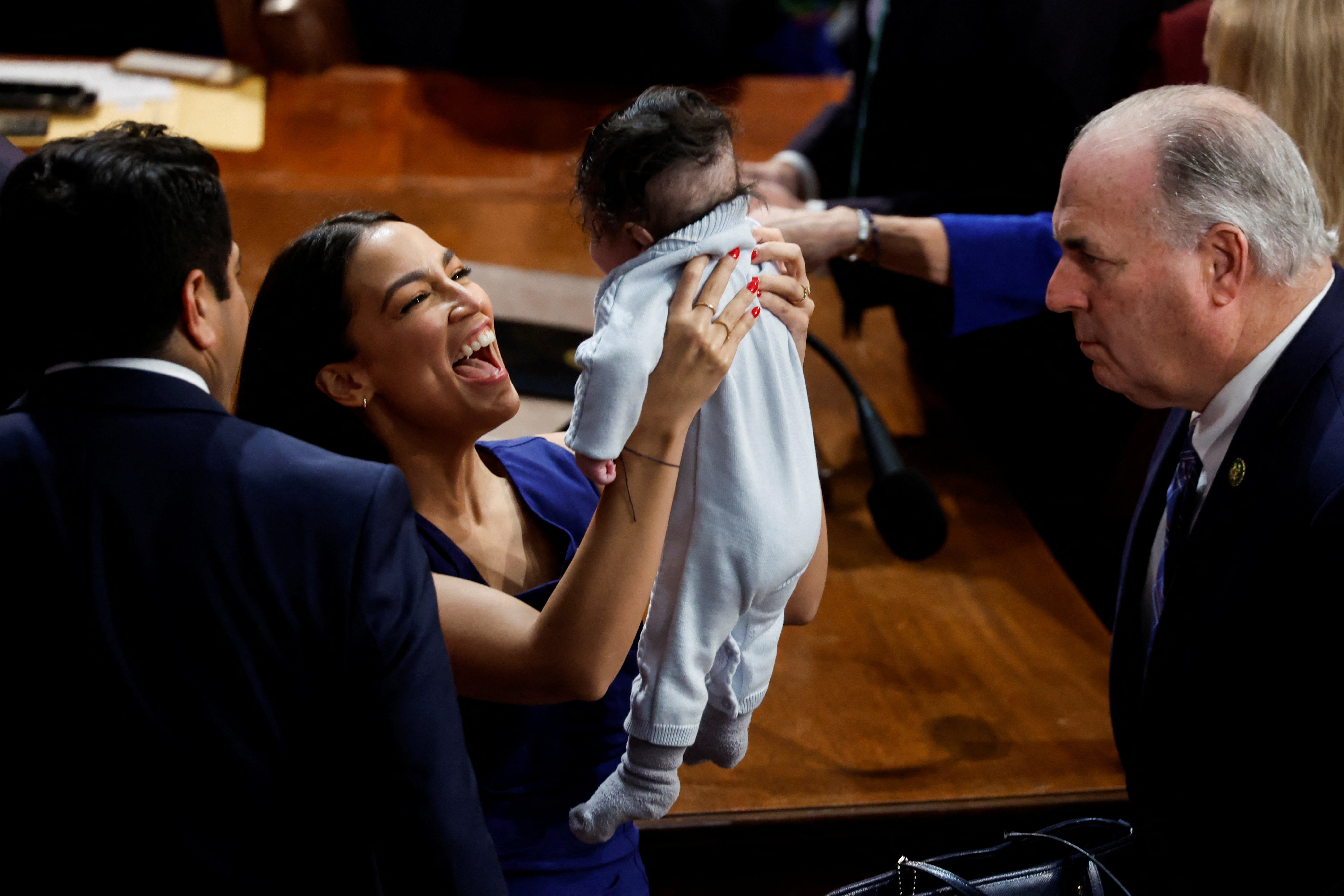 Adding to the strange atmosphere in the chamber was the presence of the families of many representatives-elect, including a number of infants