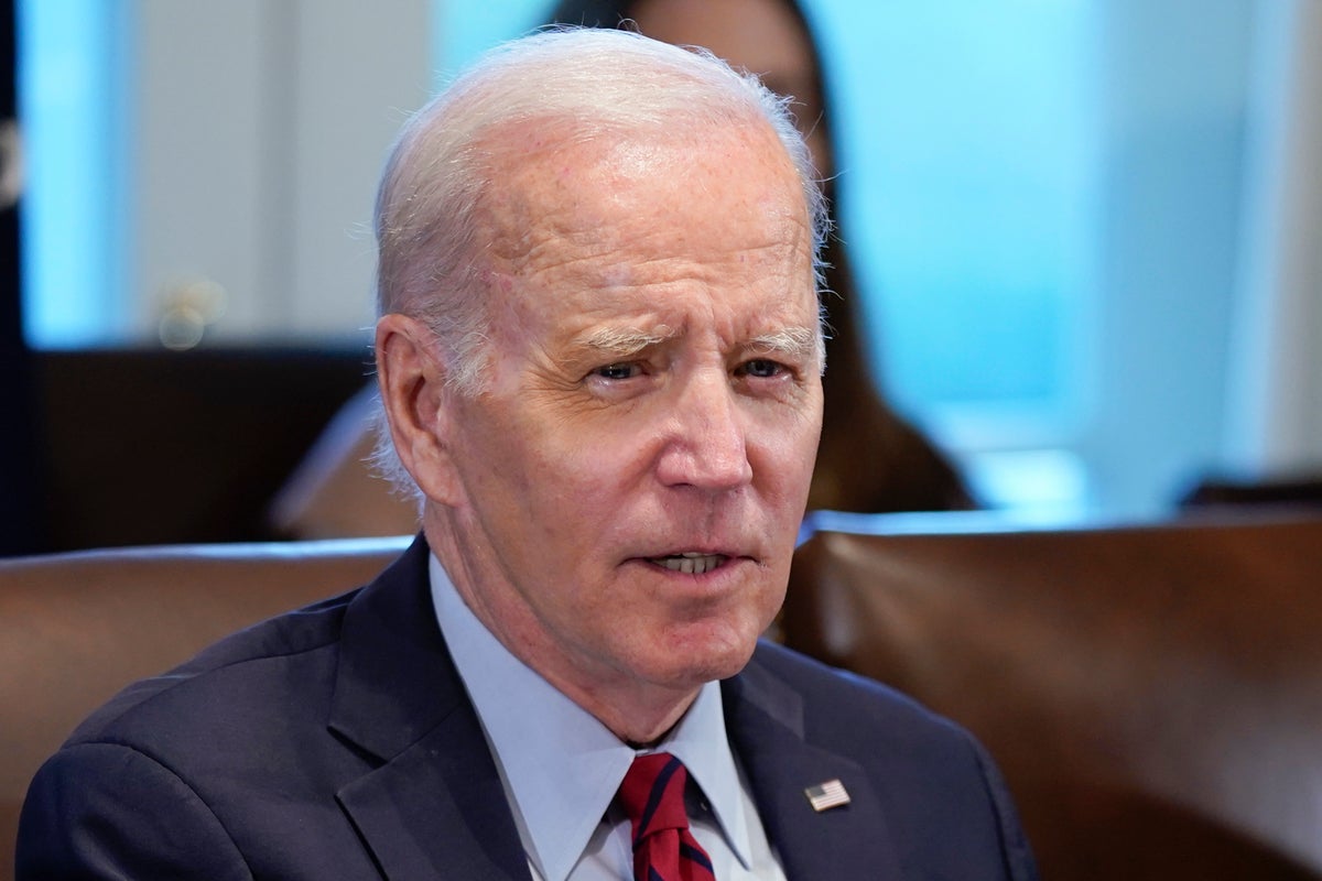 Biden signs bill to ease costs for prisoner calls to family