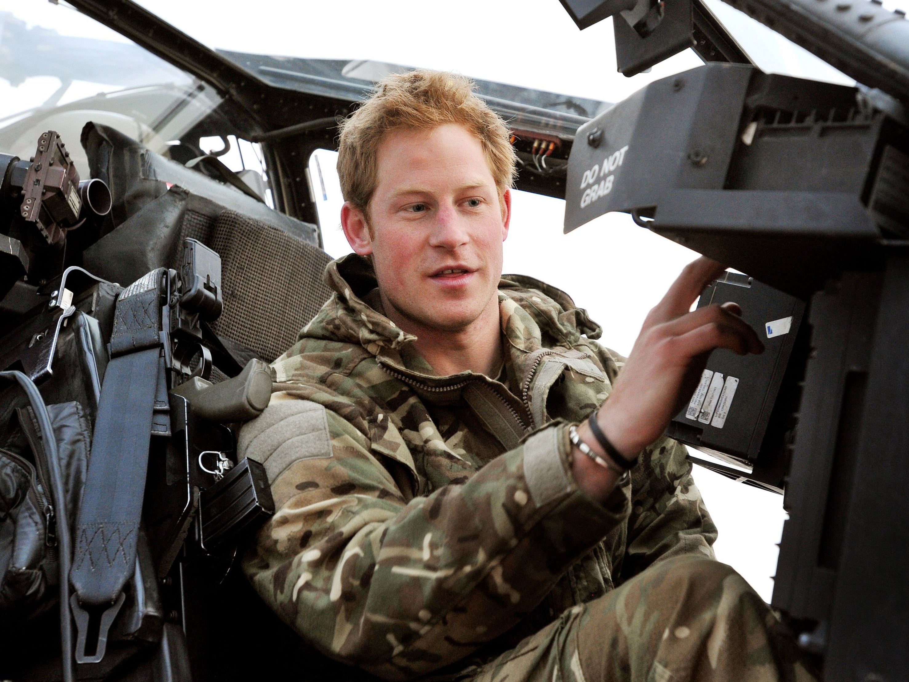 Prince Harry in an apache helicopter