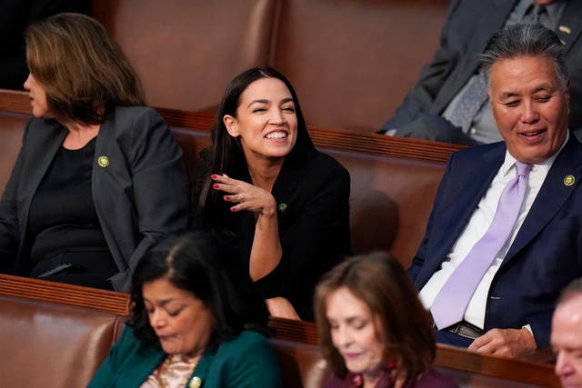 <p>Rep. Alexandria Ocasio-Cortez, D-N.Y., smiles as votes are cast in the House chamber as the House meets for a second day to elect a speaker and convene the 118th Congress in Washington, Wednesday, Jan. 4, 2023</p>