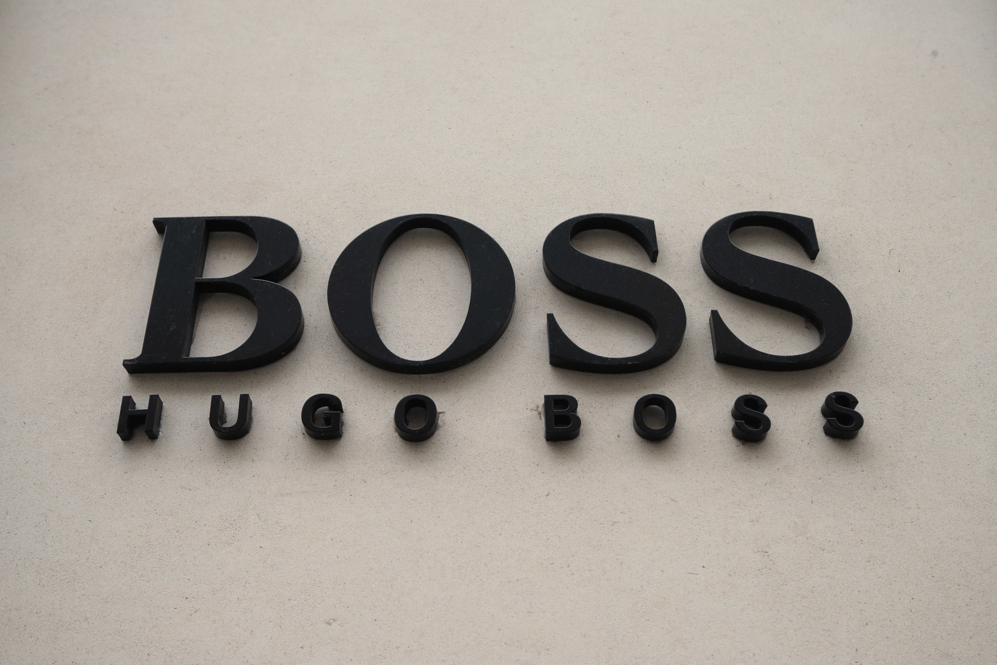 The owner of Sports Direct and House of Fraser has reduced its stake in Hugo Boss (Yui Mok/ PA)