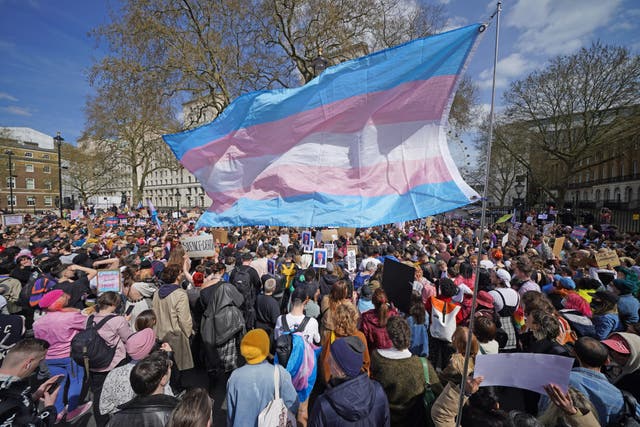 <p>People take part in a demonstration outside Downing Street in London, to protest against the exclusion of transgender people from a ban on conversion therapy.</p>