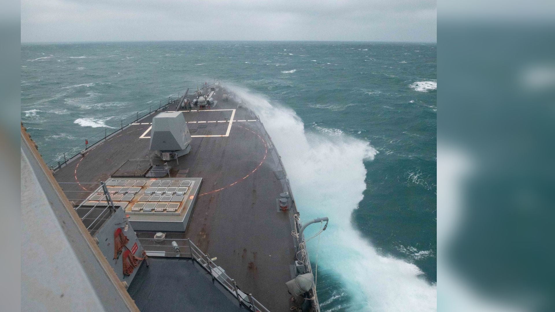 The Arleigh Burke-class guided-missile destroyer USS Chung-Hoon (DDG 93) sails through the Taiwan Strait