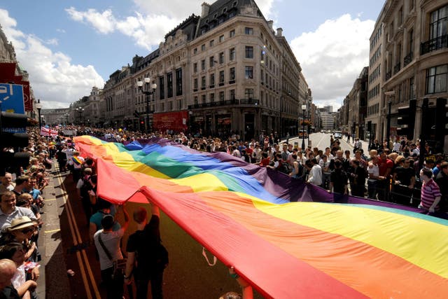 People take part in the Pride London parade on Regent Street in central London (Anthony Devlin/PA)