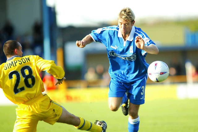 Cardiff’s Andy Legg (right) breaks past Michael Simpson of Wycombe Wanderers, during their Nationwide Division Two match at Cardiff’s Ninian Park ground. Cardiff City defeated Wycomb Wanderers 1-0. THIS PICTURE CAN ONLY BE USED WITHIN THE CONTEXT OF AN EDITORIAL FEATURE. NO UNOFFICIAL CLUB WEBSITE USE.