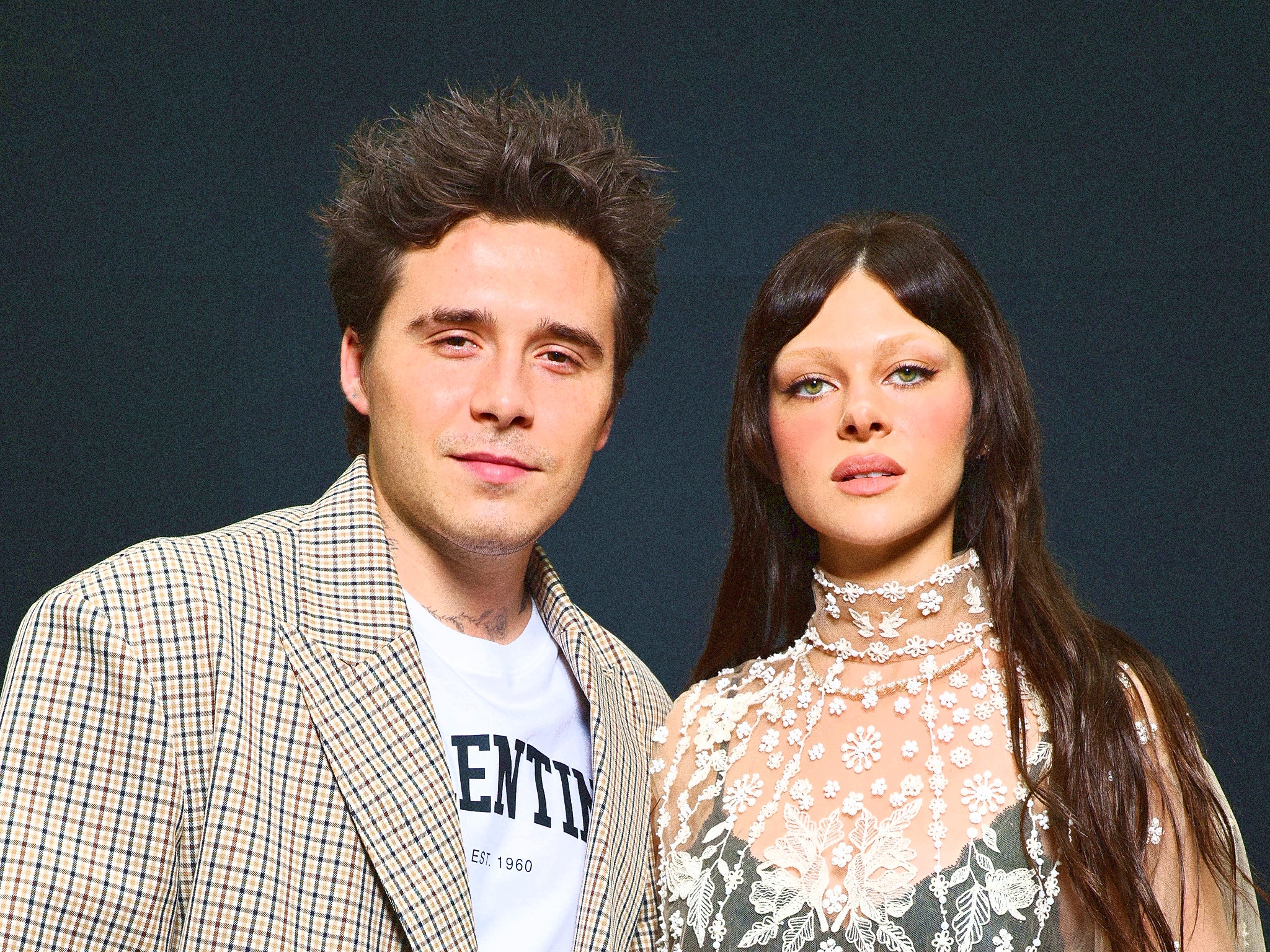 Brand Beckham Peltz: fledgling stars Brooklyn and Nicole at a Paris Fashion Week show in October