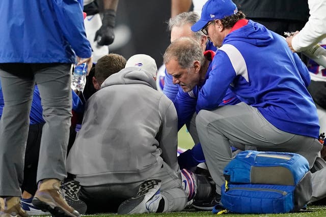 <p>Buffalo Bills’ Damar Hamlin is examined by medics on the field</p>