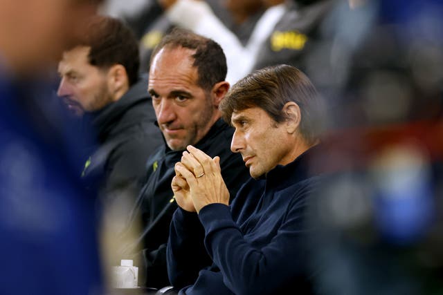 Cristian Stellini, left, has downplayed concerns over Antonio Conte’s future (Steven Paston/PA)