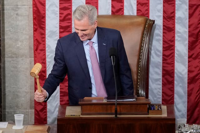 <p>Incoming House speaker Kevin McCarthy holds the gavel after accepting it from House minority leader Hakeem Jeffries on the House floor at the US Capitol in Washington, early Saturday, 7 January 2023</p>