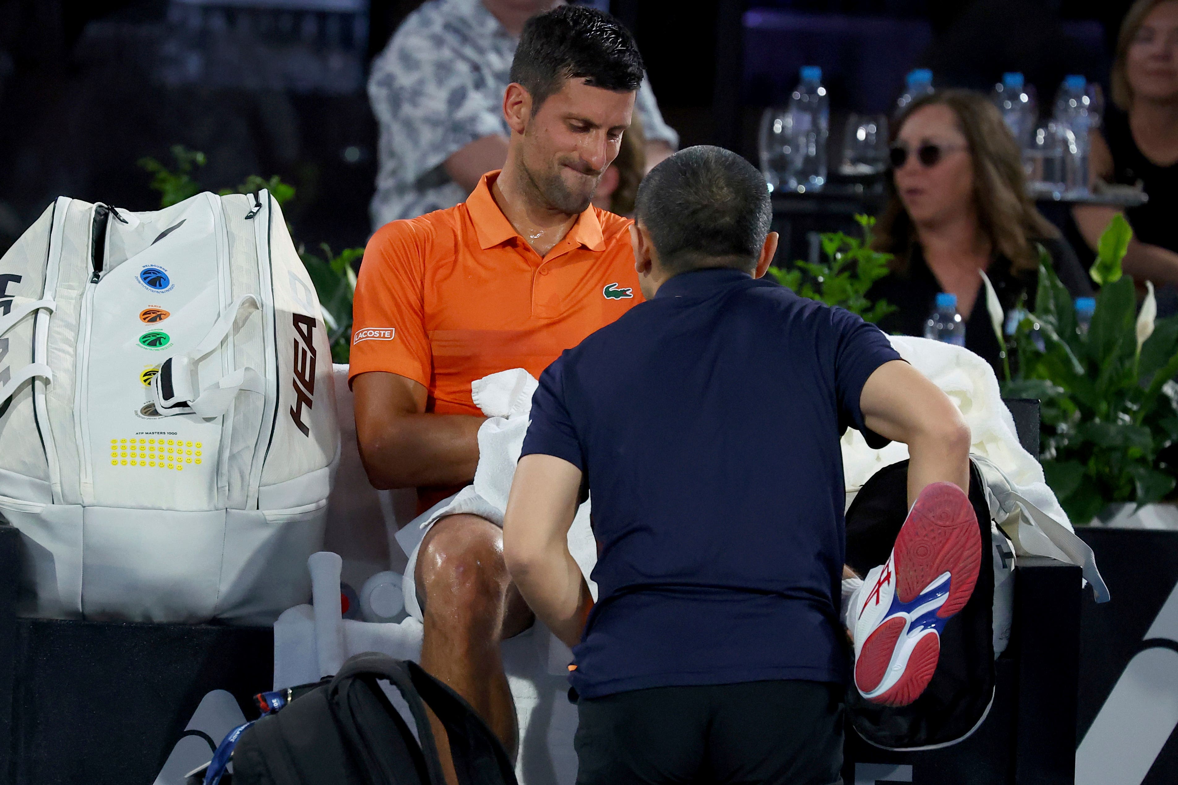 Novak Djokovic received treatment for a hamstring injury (Kelly Barnes/AP)