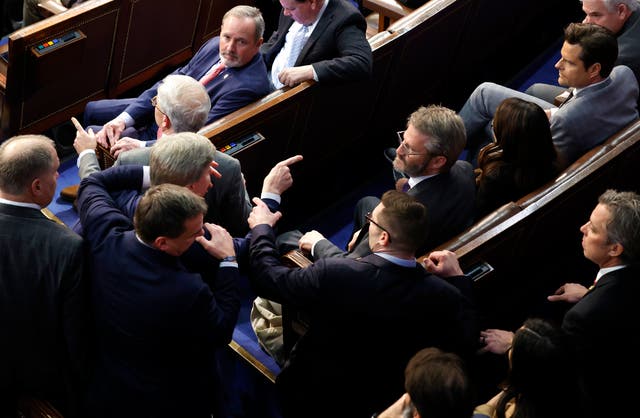 <p>U.S. Rep.-elect Mike Rogers (R-AL) is restrained after getting into an argument with Rep.-elect Matt Gaetz (R-FL) in the House Chamber during the fourth day of voting for Speaker of the House at the U.S. Capitol Building on January 06, 2023 in Washington, DC</p>