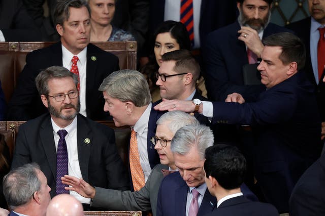 <p>Mike Rogers (R-Al) (C) is restrained by Richard Hudson (R-NC) after getting into an argument with Matt Gaetz (R-Fla) in the House Chamber during the fourth day of elections for Speaker of the House at the US Capitol Building on 6 January 2023</p>