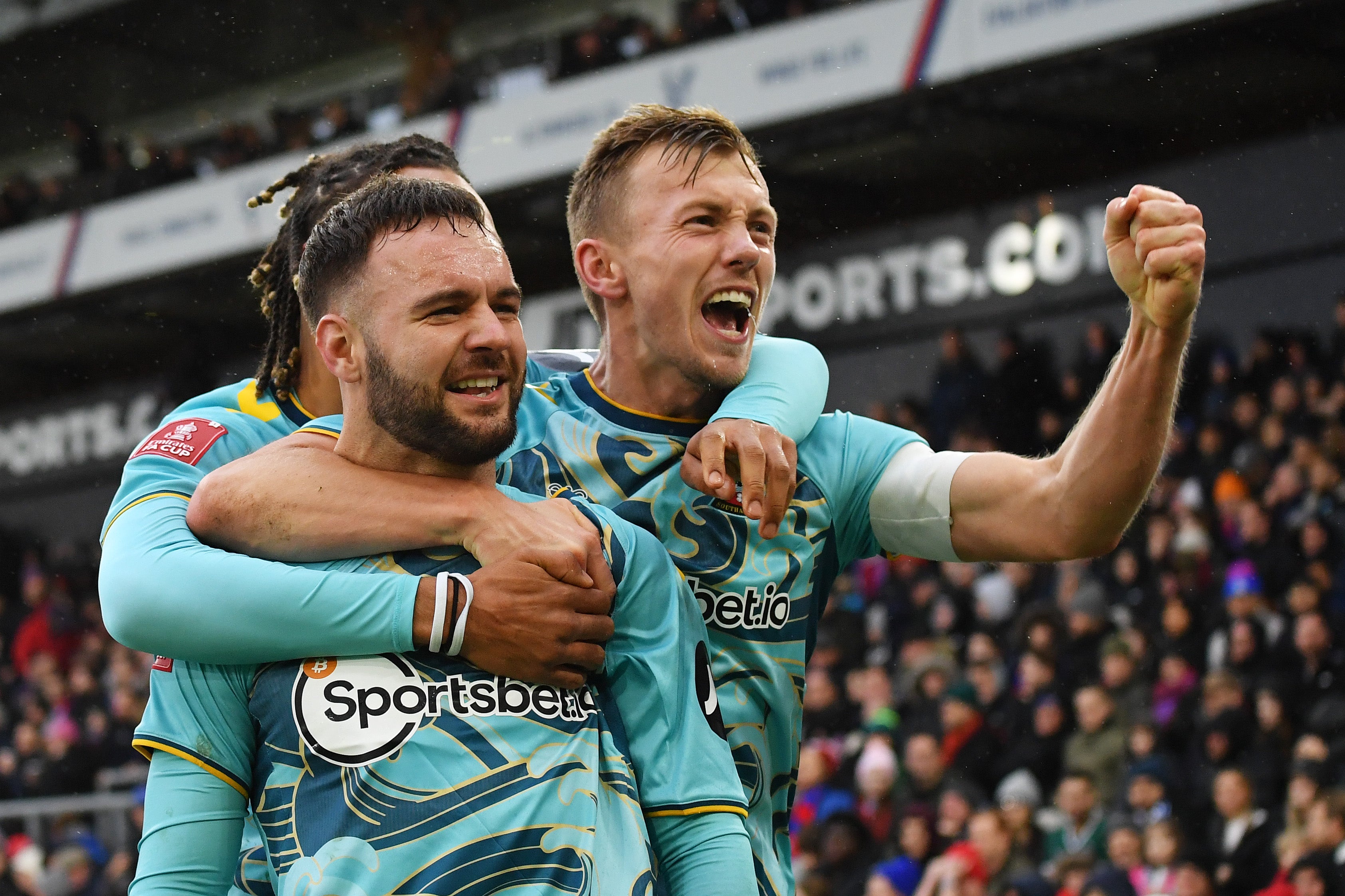 James Ward-Prowse celebrates with teammate Adam Armstrong