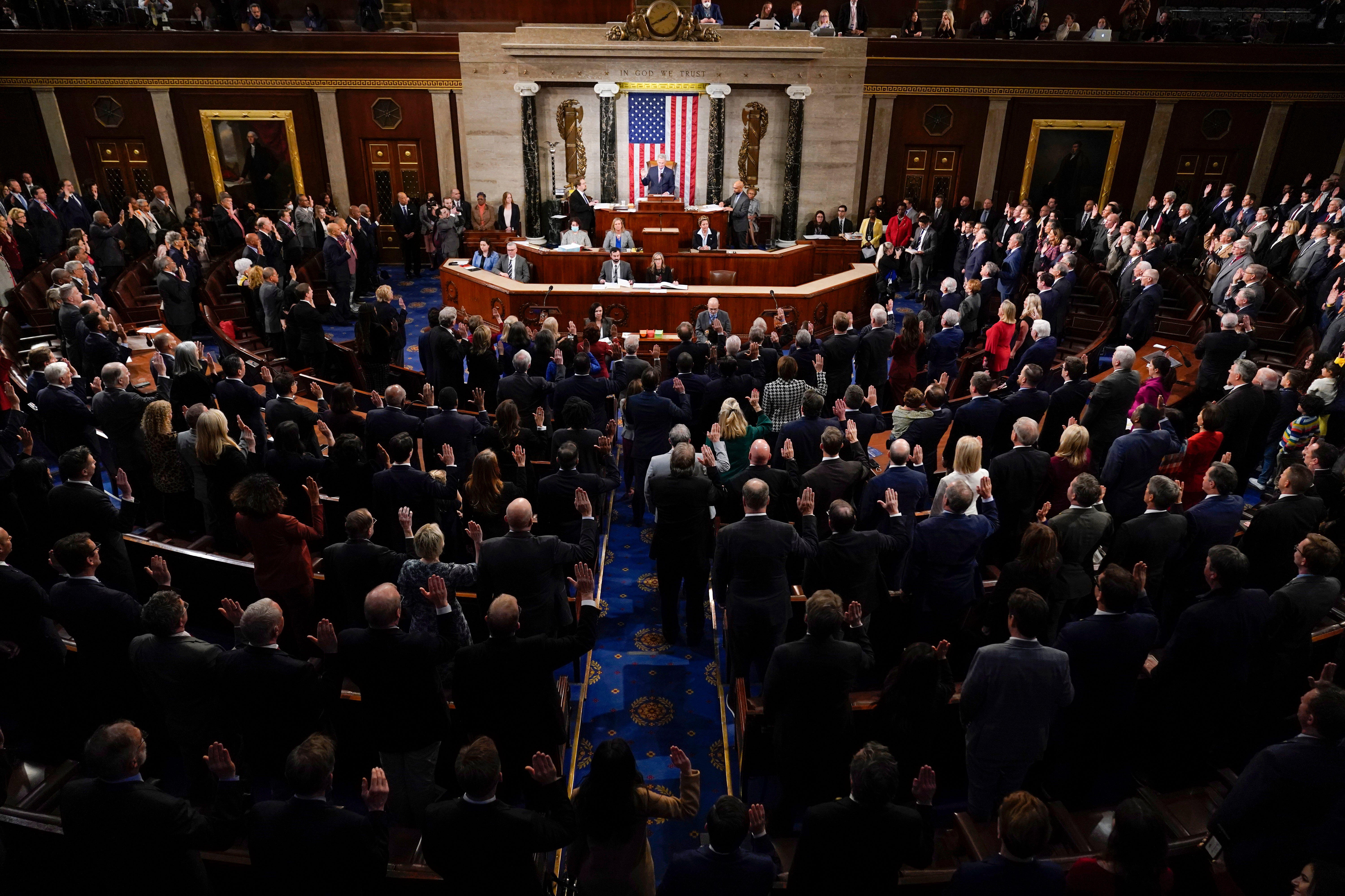Speaker Kevin McCarthy swears in members of the 118th Congress on the House floor