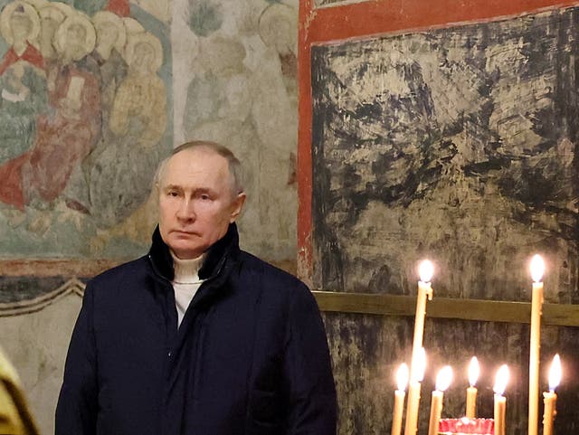 <p>Vladimir Putin attends the Orthodox Christmas service at the Kremlin</p>