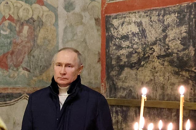 <p>Vladimir Putin attends the Orthodox Christmas service at the Kremlin</p>
