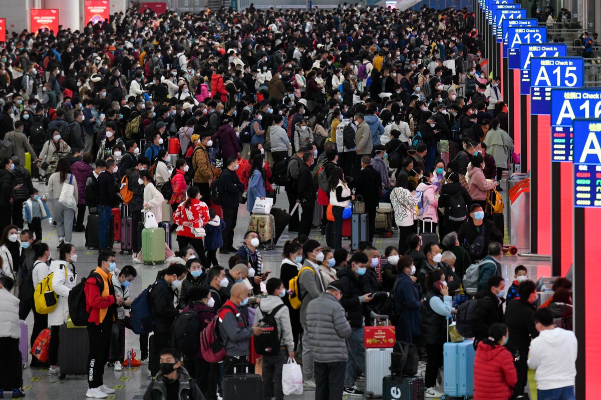 Chinese travelers rush to take advantage of reopening