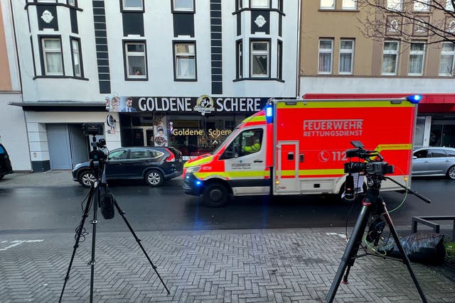 <p>TV cameras are set up in front of a building where German police have taken a 32-year-old Iranian citizen into custody</p>