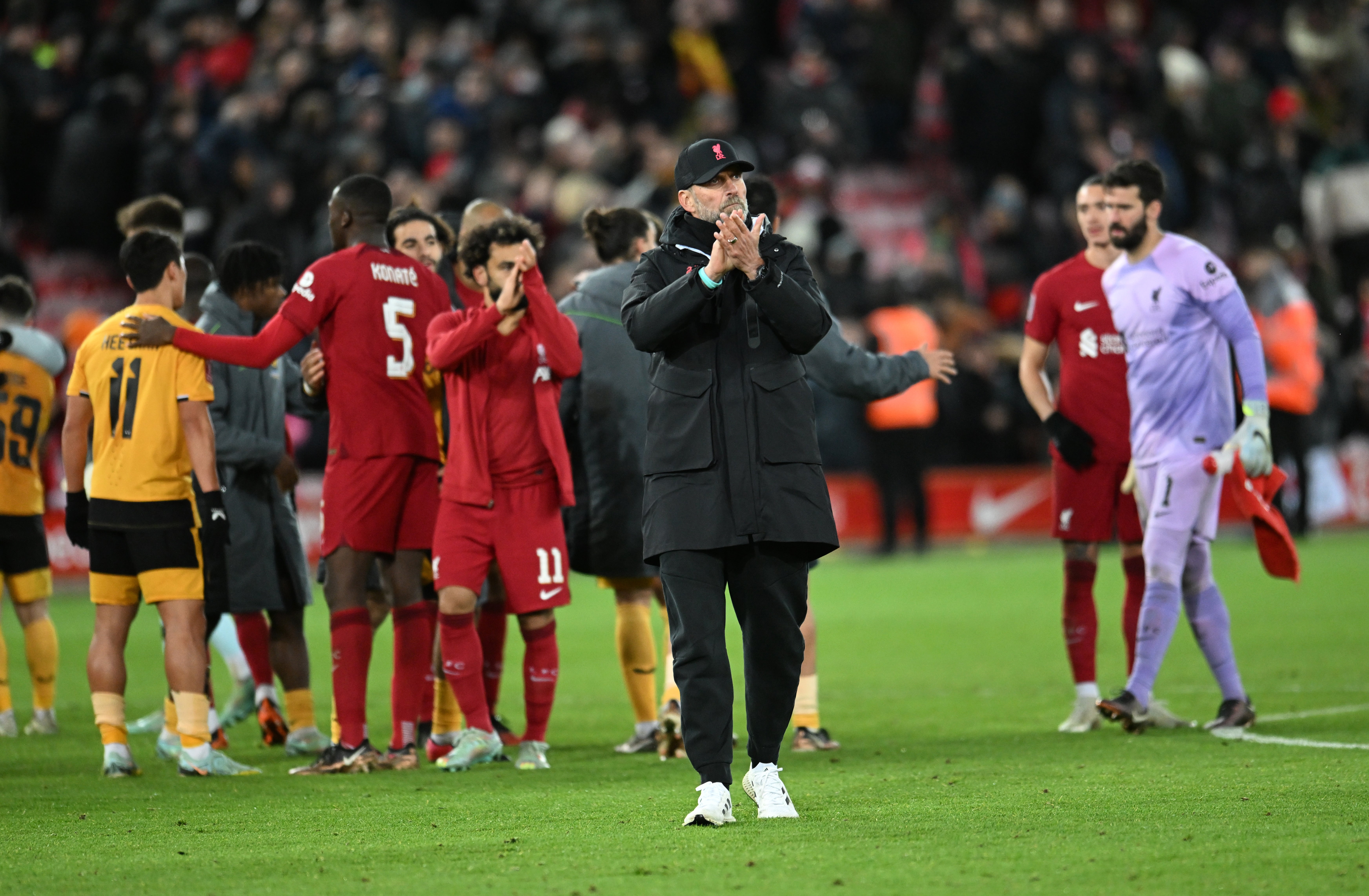Jurgen Klopp applauds the Liverpool fans after another frustrating performance
