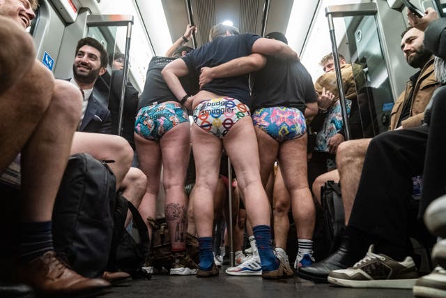 People riding the Tube in their pants (Aaron Chown/PA)