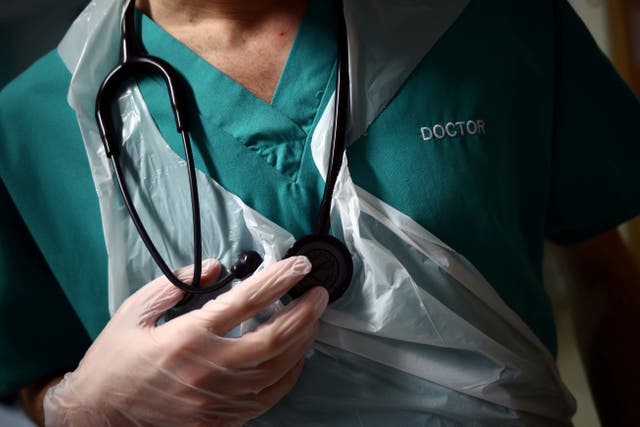 Junior doctors are voting on strike action over pay (Hannah McKay/PA)