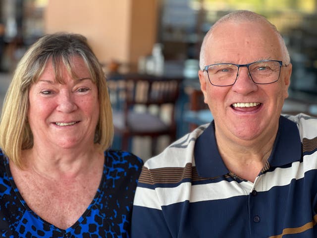 <p>Happy days: Brenda and John Stewart-Davis on the terrace of their hotel, the Stella Gardens outside Hurghada</p>